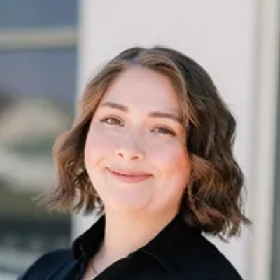 Chiropractic Assistant Jhene Smiling Outdoors