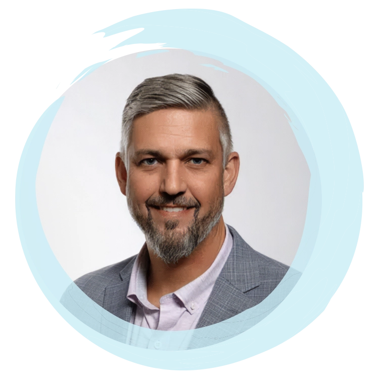 Chiropractor Daniel Atwell Smiling In Circle With Blue Brushstroke